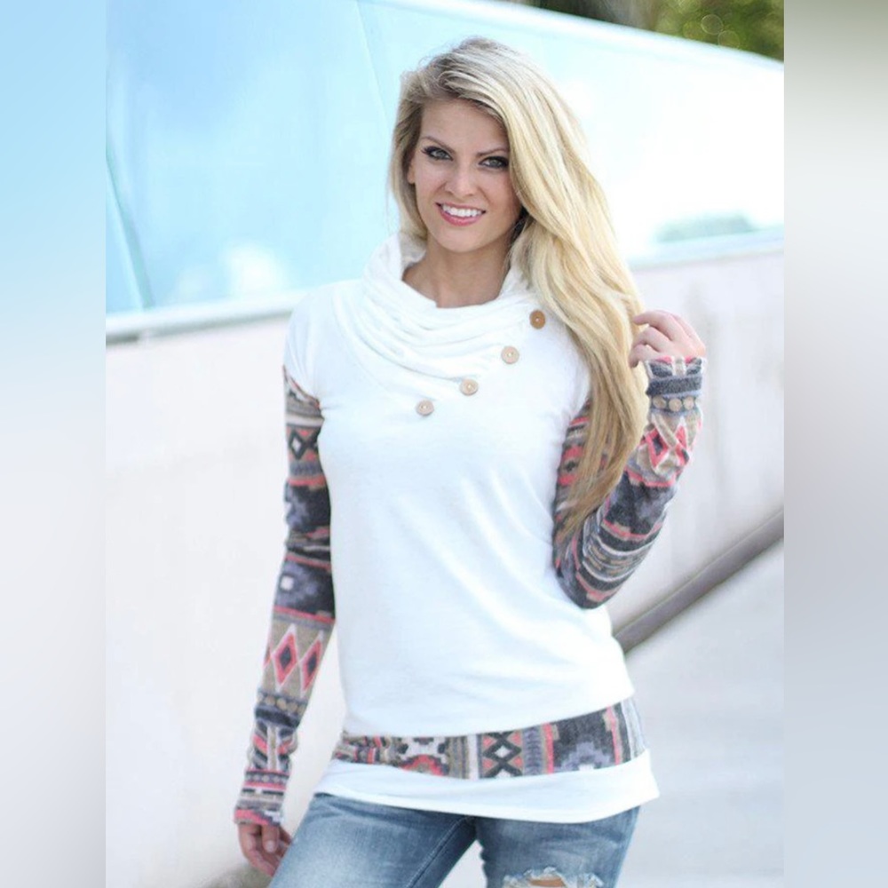White top with Aztec sleeves